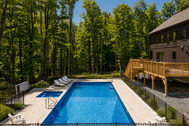 Heated gunite pool with a concrete surround